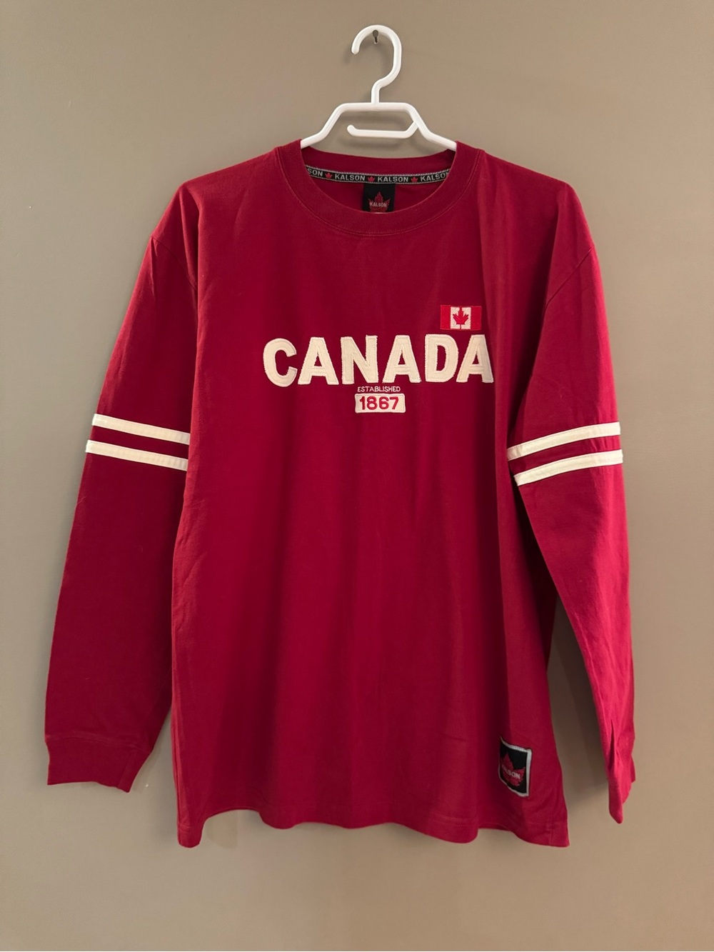 UNISEX Canada Long-Sleeve Red Crewneck Tee with embroidered logo and flag
